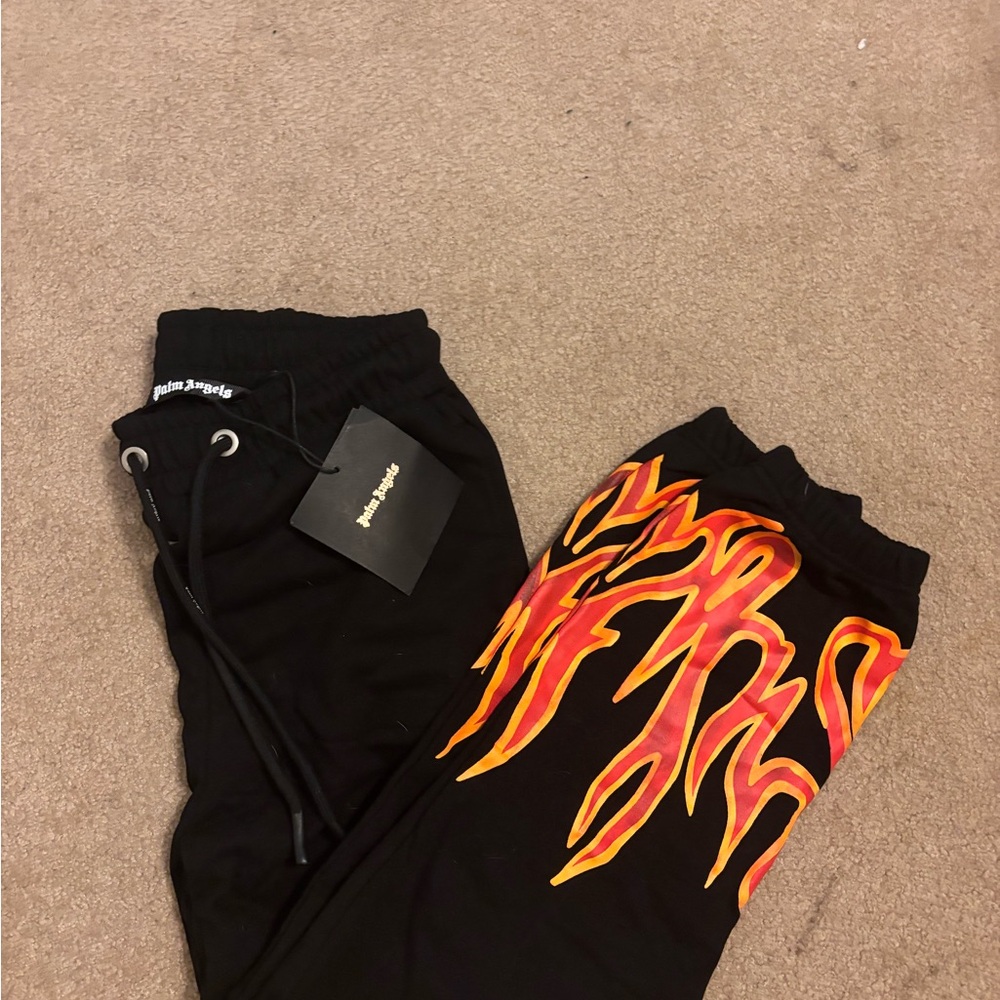 Palm Angels black with flame pants NEW WITH TAGS BOUGHT FOR 350 but never wore)